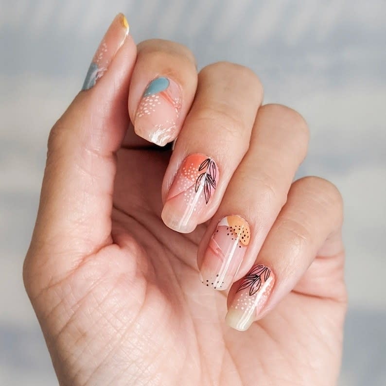 If you want a fancy at-home mani, these pretty wraps will give you salon-quality nails in minutes. Just peel, stick, file and you'll be good to go!<br /><br /><a href="https://go.skimresources.com?id=38395X987171&amp;xs=1&amp;url=https%3A%2F%2Fwww.etsy.com%2Fshop%2FPrettyFabNails%3Fref%3Dsimple-shop-header-name%26listing_id%3D914542200&amp;xcust=HPMagicBeauty6091b722e4b04620270cedda" target="_blank" rel="noopener noreferrer">Pretty Fab Nails</a> is a small Etsy shop that specializes in darling nail wrap designs, stickers and nail tools. <br /><br /><strong>Promising review:</strong> "I wanted to wait to review these nail wraps as they just kept going! I bought these thinking I would be happy if they lasted the weekend... <strong>I finally removed them last night after 26 days!</strong> I followed the application instructions (swipe nail with nail polish remover beforehand), and finished with a top coat, making sure to cap the tip of the nail too. When wearing these nails, I bathed, I swam, and they still lasted! One set will be enough for two applications for short nails. I would definitely purchase these again!" &mdash; <a href="https://go.skimresources.com?id=38395X987171&amp;xs=1&amp;url=https%3A%2F%2Fwww.etsy.com%2Fshop%2FPrettyFabNails%3Fref%3Dsimple-shop-header-name%26listing_id%3D914542200&amp;xcust=HPMagicBeauty6091b722e4b04620270cedda" target="_blank" rel="noopener noreferrer">Charlotte Wilkinson</a><br /><br /><strong>Get a set from <a href="https://go.skimresources.com?id=38395X987171&amp;xs=1&amp;url=https%3A%2F%2Fwww.etsy.com%2Fshop%2FPrettyFabNails%3Fref%3Dsimple-shop-header-name%26listing_id%3D914542200&amp;xcust=HPMagicBeauty6091b722e4b04620270cedda" target="_blank" rel="nofollow noopener noreferrer" data-skimlinks-tracking="5906615" data-vars-affiliate="AWIN" data-vars-campaign="BeautyProductsCouldBeMagicSuazo3-25-21-5906615-" data-vars-href="https://www.awin1.com/cread.php?awinmid=6220&amp;awinaffid=304459&amp;clickref=BeautyProductsCouldBeMagicSuazo3-25-21-5906615-&amp;ued=https%3A%2F%2Fwww.etsy.com%2Fshop%2FPrettyFabNails" data-vars-keywords="cleaning" data-vars-link-id="16596488" data-vars-price="" data-vars-product-id="21066870" data-vars-product-img="" data-vars-product-title="" data-vars-retailers="etsy" data-ml-dynamic="true" data-ml-dynamic-type="sl" data-orig-url="https://www.awin1.com/cread.php?awinmid=6220&amp;awinaffid=304459&amp;clickref=BeautyProductsCouldBeMagicSuazo3-25-21-5906615-&amp;ued=https%3A%2F%2Fwww.etsy.com%2Fshop%2FPrettyFabNails" data-ml-id="34">Pretty Fab Nails</a> on Etsy for <a href="https://go.skimresources.com?id=38395X987171&amp;xs=1&amp;url=https%3A%2F%2Fwww.etsy.com%2Flisting%2F914542200%2Fpastel-floral-negative-space-nail-polish&amp;xcust=HPMagicBeauty6091b722e4b04620270cedda" target="_blank" rel="nofollow noopener noreferrer" data-skimlinks-tracking="5906615" data-vars-affiliate="AWIN" data-vars-campaign="BeautyProductsCouldBeMagicSuazo3-25-21-5906615-" data-vars-href="https://www.awin1.com/cread.php?awinmid=6220&amp;awinaffid=304459&amp;clickref=BeautyProductsCouldBeMagicSuazo3-25-21-5906615-&amp;ued=https%3A%2F%2Fwww.etsy.com%2Flisting%2F914542200%2Fpastel-floral-negative-space-nail-polish" data-vars-keywords="cleaning" data-vars-link-id="16596487" data-vars-price="" data-vars-product-id="21066851" data-vars-product-img="https://f.i.etsystatic.com/24604147/r/il/34ad00/2793609679/il_1588xN.2793609679_odcc.jpg" data-vars-product-title="Pastel Floral Negative Space Nail Polish Wraps; Transparent Spring Floral Nail Strips" data-vars-retailers="etsy" data-ml-dynamic="true" data-ml-dynamic-type="sl" data-orig-url="https://www.awin1.com/cread.php?awinmid=6220&amp;awinaffid=304459&amp;clickref=BeautyProductsCouldBeMagicSuazo3-25-21-5906615-&amp;ued=https%3A%2F%2Fwww.etsy.com%2Flisting%2F914542200%2Fpastel-floral-negative-space-nail-polish" data-ml-id="35">$5.99</a>.</strong>