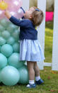 <p>There was a lot going on at this children's party during the royal tour to Canada, but Charlotte discovering balloons was a highlight. (Getty Images)</p> 