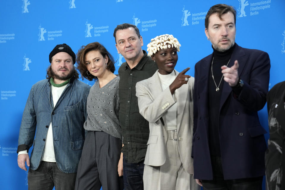 The Film Festival, Berlinale International Jury from left, Brady Corbet, Jasmine Trinca, Christian Petzold, Lupita Nyong'o and Albert Serra pose for media during a photo-call at the opening day of International Film Festival, Berlinale, in Berlin, Thursday, Feb. 15, 2024. The 74th edition of the festival will run until Sunday, Feb. 25, 2024 at the German capital. (AP Photo/Ebrahim Noroozi)