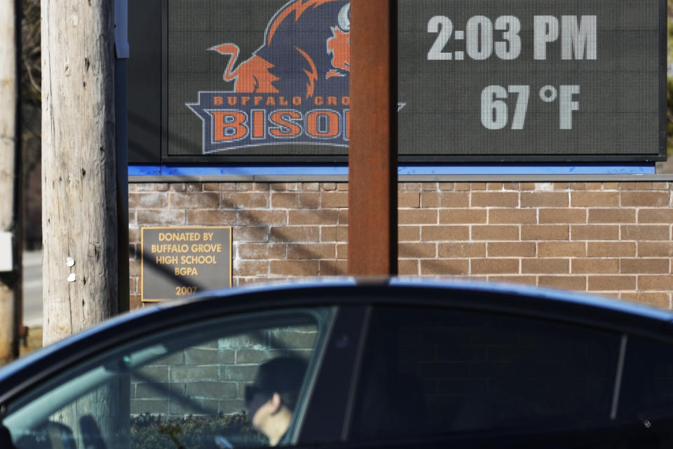 A sign shows the current outdoor temperature in the Chicago suburb of Buffalo Grove, Ill., Monday, Feb. 26, 2024. Record warmth is expected today and Tuesday. All time February highest temperature records could also be tied or broken in Illinois. (AP Photo/Nam Y. Huh)