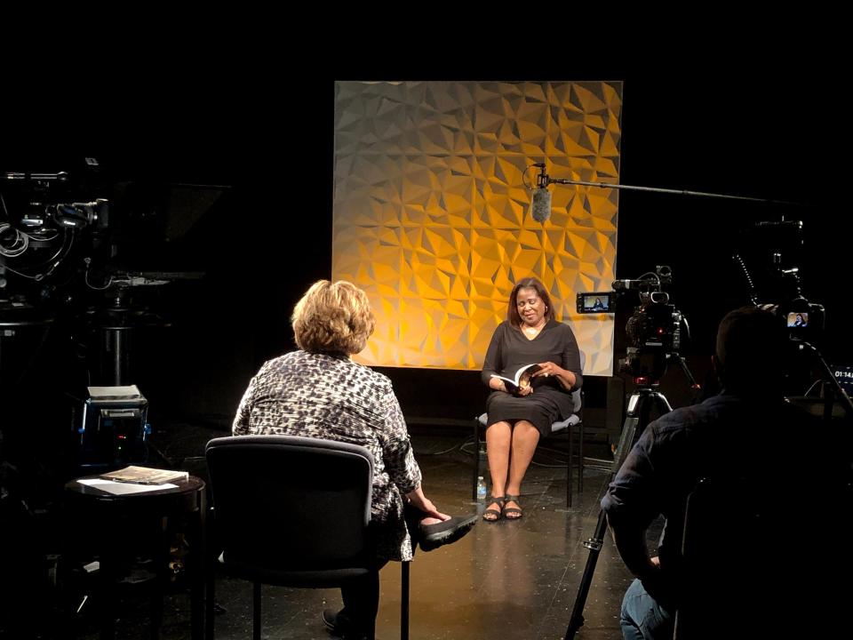 Behind the scenes of the filming of Panhandle PBS's Emmy winning "Living While Black" interview with Claudia Stuart. Karen Welch, left, conducts the interview while Nolyn Hill, right, operates the camera.