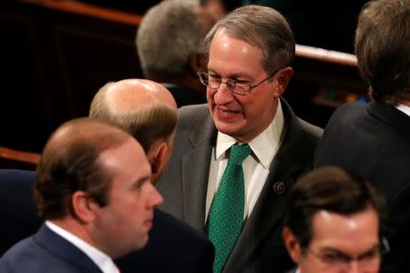 U.S. House Judiciary Committee Chairman Bob Goodlatte (R-VA) speaks with fellow members on the House floor on the first day of the new session of Congress in Washington, U.S. January 3, 2017. REUTERS/Jonathan Ernst