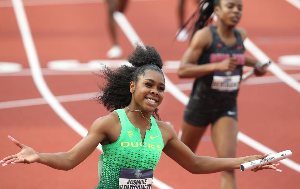 Oregon's women's 4x100 meter anchor Jasmine Montgomery celebrates winning the last heat to advance on day two of the NCAA Outdoor Track & Field Championships Thursday June 9, 2022 at Hayward Field in Eugene, Ore.