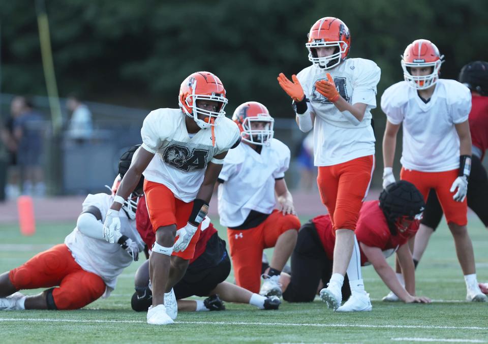 Oliver Ames defense stops Whitman-Hanson on fourth down during a scrimmage on Friday, August 30, 2024.