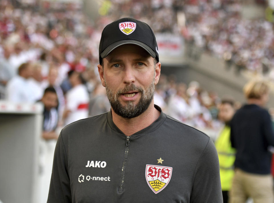 Stuttgart's head coach Sebastian Hoeness walks along the sidelines before the German Bundesliga soccer match between VfB Stuttgart and Eintracht Frankfurt in Stuttgart, Germany, Saturday, April 13, 2024. (Jan-Philipp Strobel/dpa via AP)