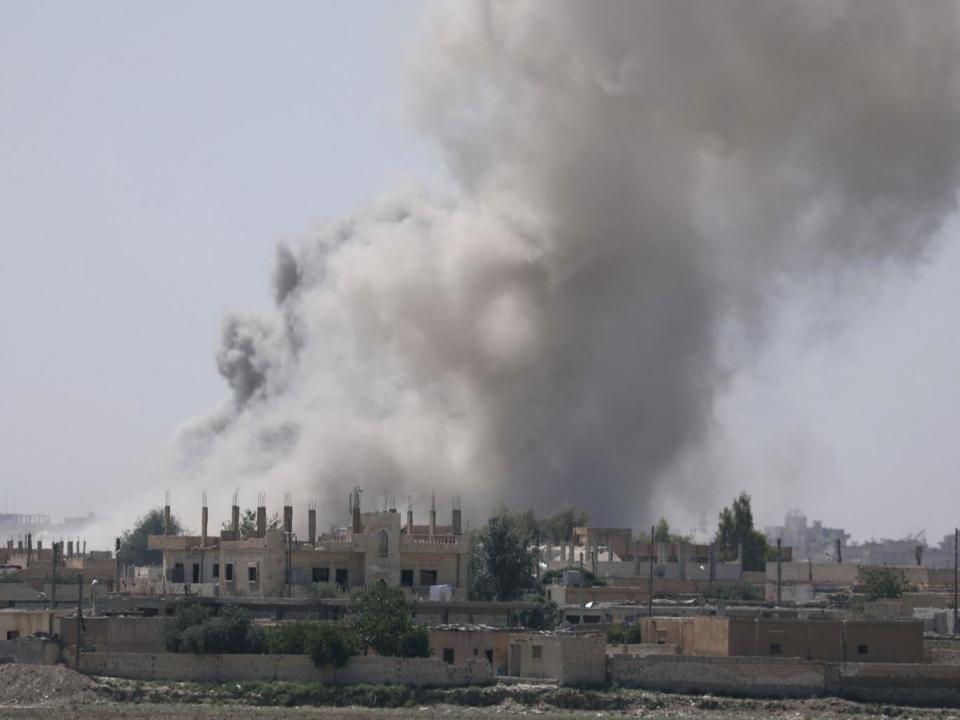 Smoke rises from the al-Mishlab district at Raqqa’s southeastern outskirts on 7 June (Reuters)