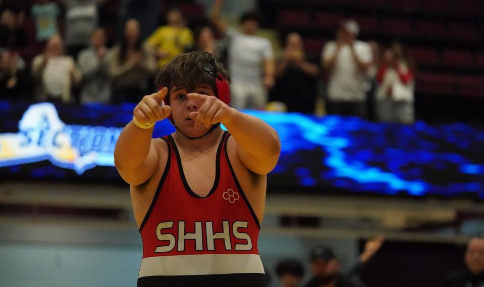 Sleepy Hollow's Thomas Kellas wrestles Putnam Valley's Alexander Gecaj in the 215-pound championship match at the Section 1, Division II wrestling championships at Westchester County Center on Saturday, Feb. 10, 2024.