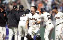 Jun 6, 2018; San Francisco, CA, USA; San Francisco Giants catcher Nick Hundley (center) celebrates after defeating the Arizona Diamondbacks in the tenth inning of a Major League Baseball game at AT&T Park. Mandatory Credit: D. Ross Cameron-USA TODAY Sports