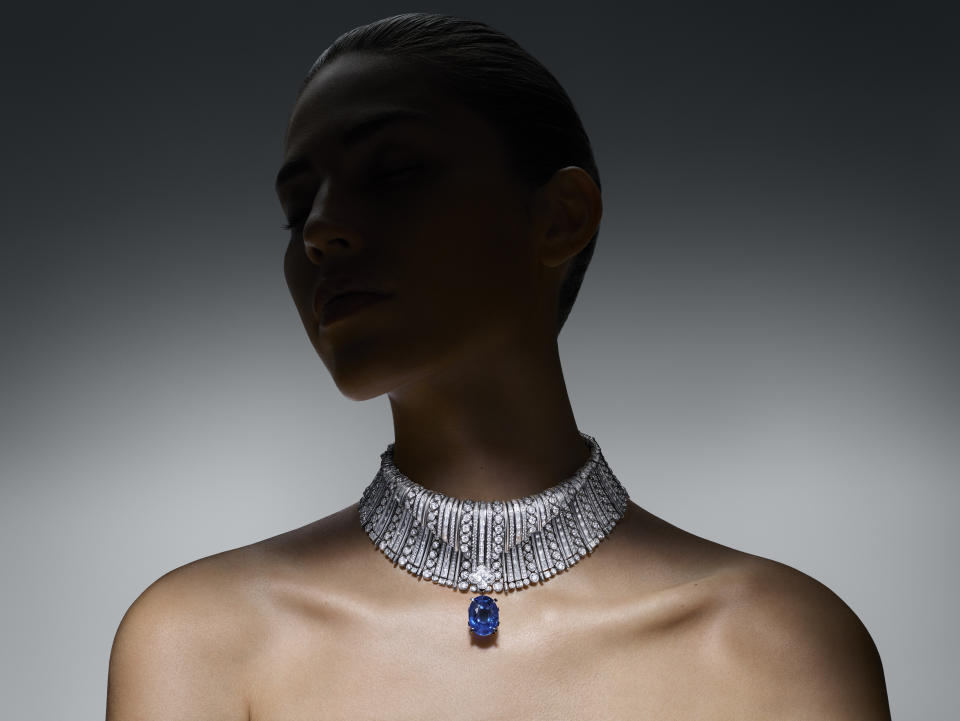 The Wave necklace with its sapphire center stone.