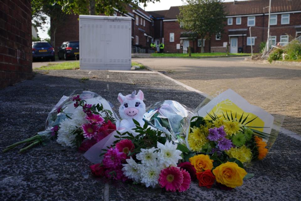 Floral tributes left in Biddick Drive, Keyham in Plymouth, Devon, where five people were killed by gunman Jake Davison in a firearms incident on Thursday evening. Picture date: Monday August 16, 2021. (PA Archive)