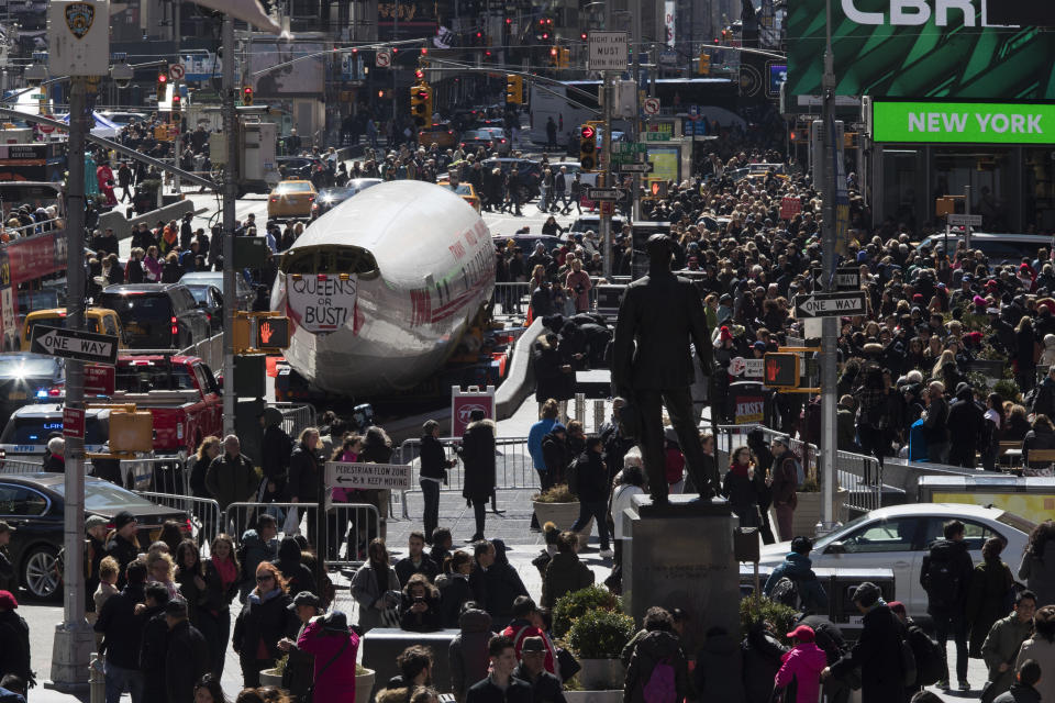 A Lockheed Constellation L-1649A Starliner, known as the "Connie, is parked in New York's Times Square during a promotional event, Saturday, March 23, 2019, in New York. The vintage commercial airplane will serve as the cocktail lounge outside the TWA Hotel at JFK airport. (AP Photo/Mary Altaffer)