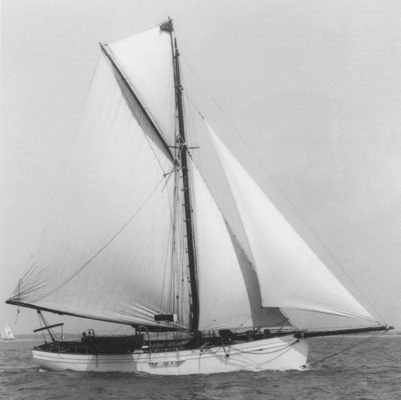 A classic wooden gaff cutter sailing yacht called Tally Ho