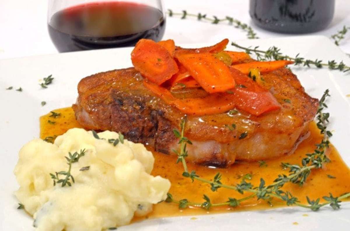 <p>Platter Talk</p><p>Cayenne Seared Pork Chops with Orange-Glazed Carrots are an easy and flavorful fall meal.</p><p><strong>Get the recipe: <a href="https://www.plattertalk.com/cayenne-seared-pork-chops-with-orange-glazed-carrots/" rel="nofollow noopener" target="_blank" data-ylk="slk:Cayenne Seared Pork Chops with Orange-Glazed Carrots;elm:context_link;itc:0;sec:content-canvas" class="link rapid-noclick-resp">Cayenne Seared Pork Chops with Orange-Glazed Carrots</a></strong></p>