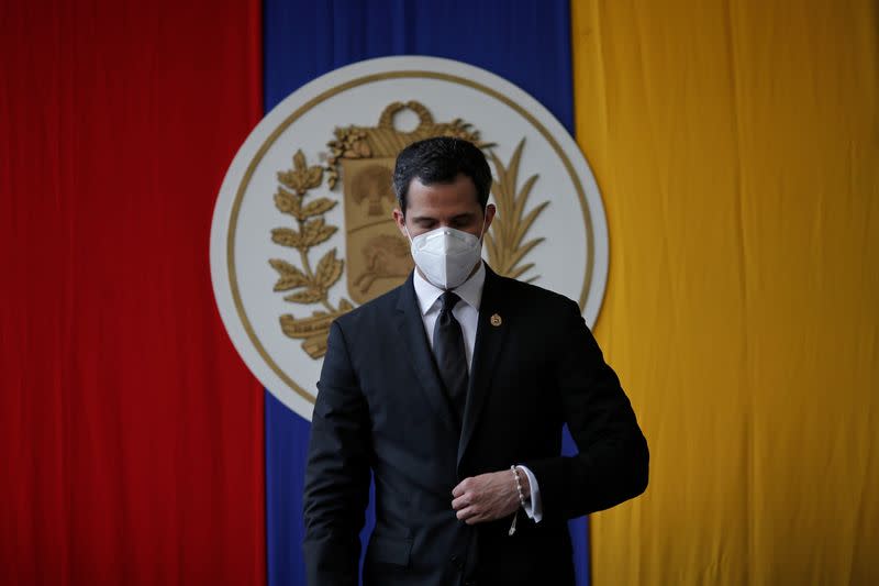 Venezuela's opposition leader Juan Guaido attends a session of Venezuela's National Assembly at a public park in Caracas