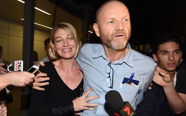 60 Minutes journalist Tara Brown and 60 Minutes producer Stephen Rice arrive at Sydney International Airport. Photo: AAP Image/Dean Lewins