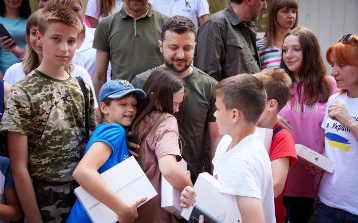 President Volodymyr Zelensky visits Ukrainians who had been forced to leave their homes - AFP