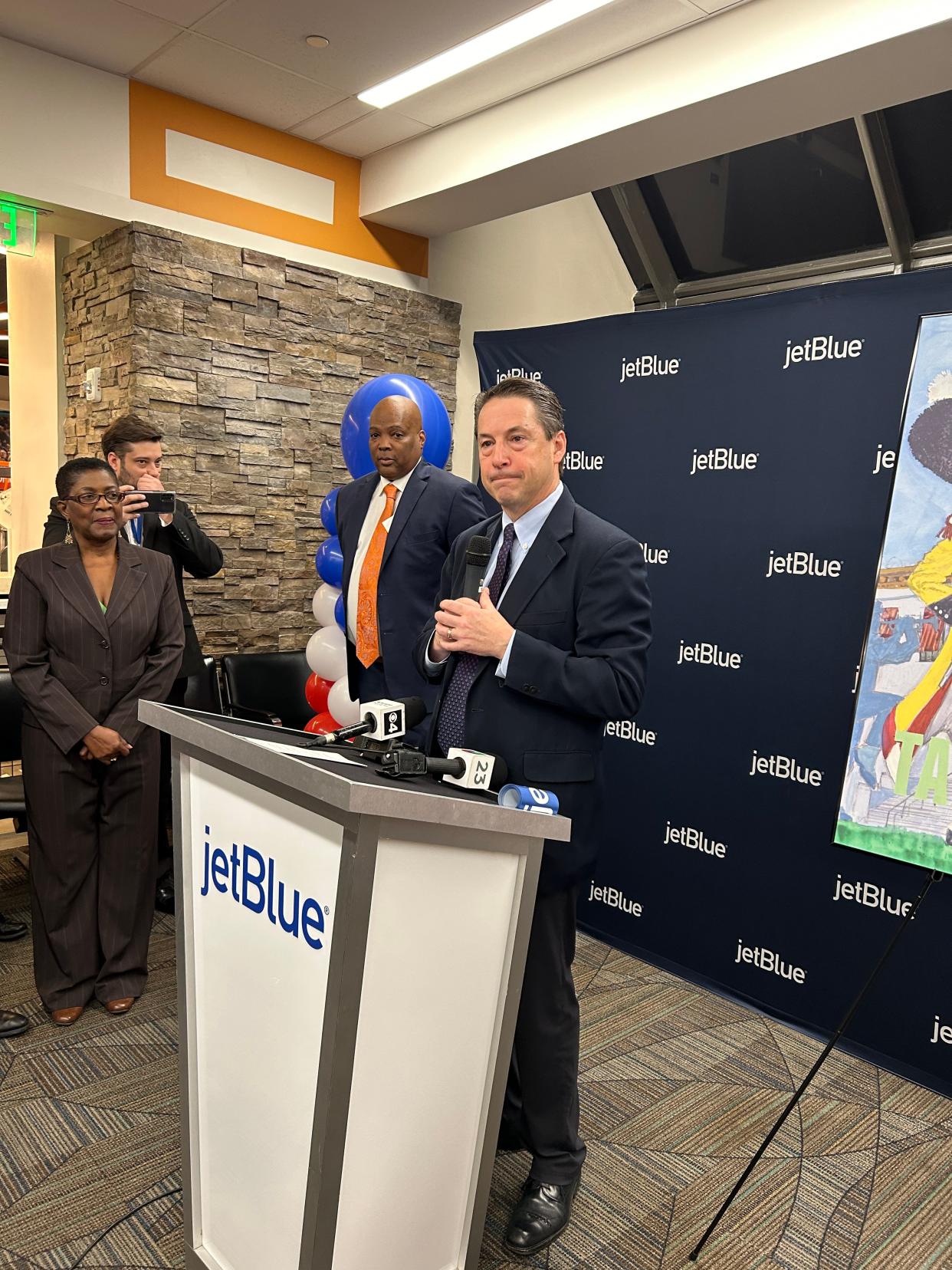 JetBlue General counsel Robert Land announces $49-one-way flights between Fort Lauderdale and Tallahassee. The inaugural flight was Jan. 4.