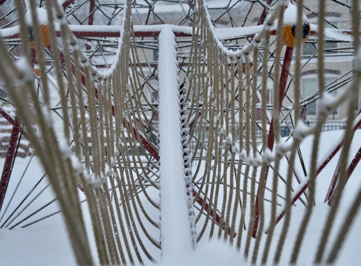 Snowfall along a play-rope system at National Road Park in Hagerstown's West End on Saturday, Jan. 6, 2024.