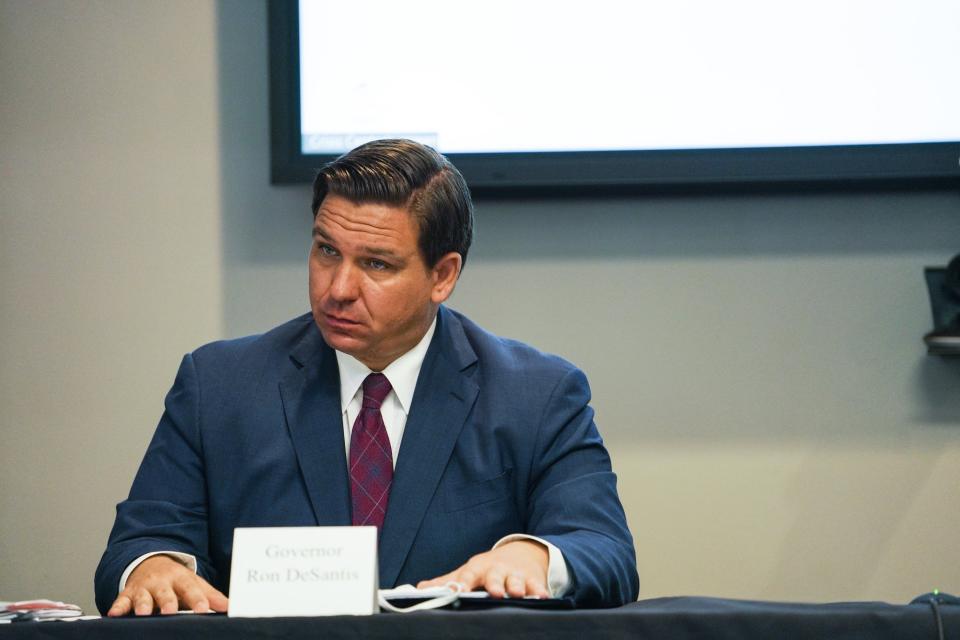 Florida Gov. Ron DeSantis and First Lady Casey DeSantis hold a roundtable discussion regarding mental health and COVID-19 at the Tampa Bay Crisis Center on Thursday, July 16, 2020 in Tampa. (Martha Asencio-Rhine/Tampa Bay Times via AP)