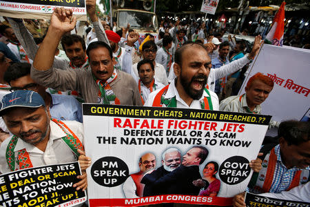 Supporters of India's main opposition Congress Party shout slogans during a protest demanding from government to disclose the details of Rafale fighter planes deal, in Mumbai, July 30, 2018. REUTERS/Francis Mascarenhas/Files