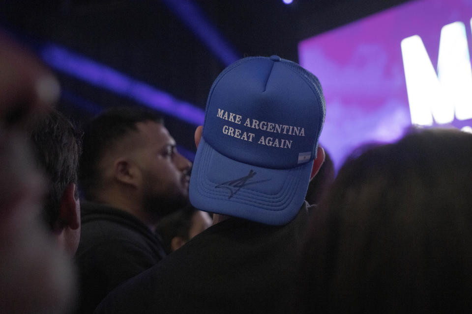 A supporter of Javier Milei wears a "Make Argentina Great Again" hat during the closing campaign rally of Javier Milei in Buenos Aires, Argentina, Wednesday, Oct. 18, 2023. General elections are set for Oct. 22. (AP Photo/Victor R. Caivano)