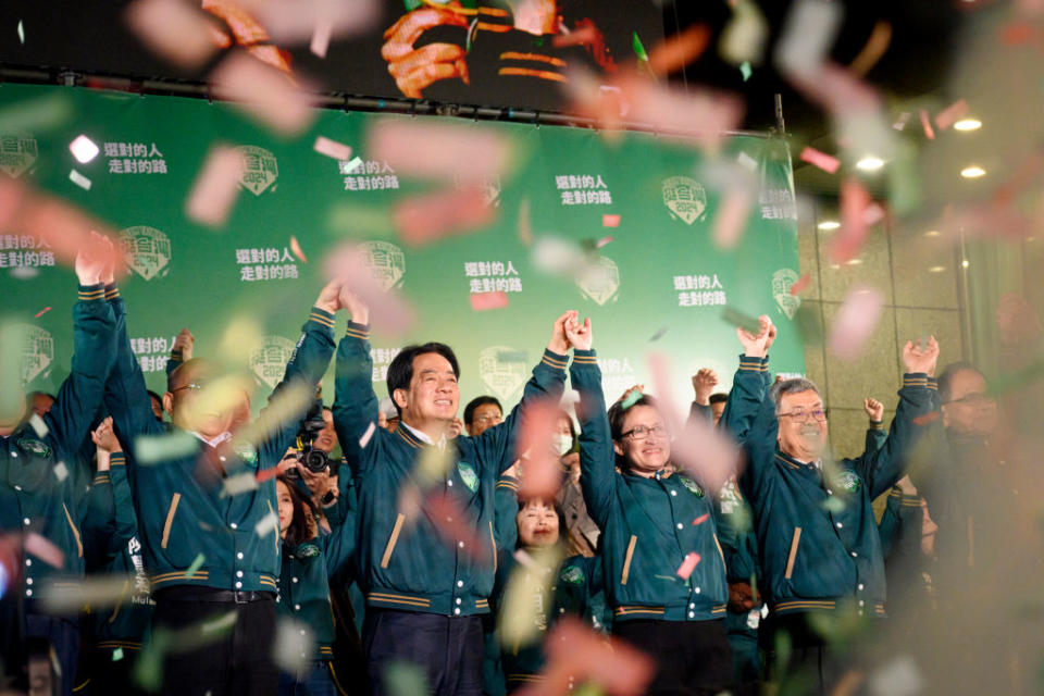 President-elect Lai Ching-te and Vice President-elect Hsiao Bi Khim of the pro-sovereignty Democratic Progressive Party celebrate victory in Taiwan’s 2024 presidential election on Jan. 13, 2024.<span class="copyright">Alberto Buzzola—LightRocket/Getty Images</span>