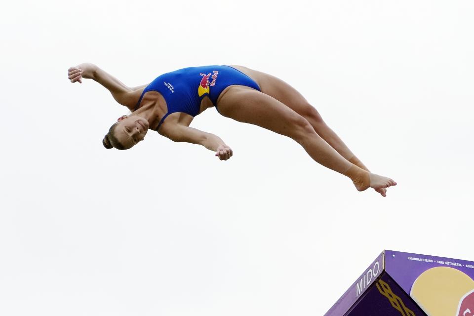 Ellie Smart competes in the Red Bull Cliff Diving World Series, Saturday, June 8, 2024, in Boston. (AP Photo/Michael Dwyer)