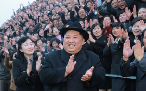 North Korean leader Kim Jong-Un visiting the newly-renovated Pyongyang Teachers' University in Pyongyang - Credit: AFP