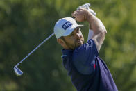 Louis Oosthuizen, of South Africa, plays his shot from the sixth tee during the third round of the US Open Golf Championship, Saturday, Sept. 19, 2020, in Mamaroneck, N.Y. (AP Photo/John Minchillo)