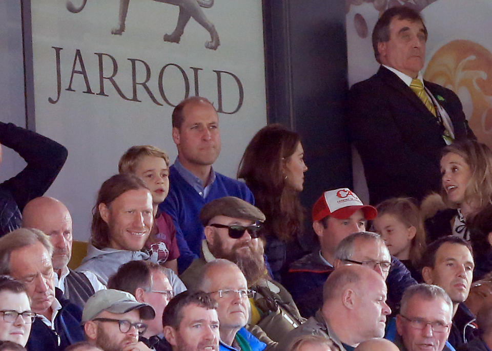 NORWICH, ENGLAND - OCTOBER 05: Prince George of Cambridge,  Prince William, Duke of Cambridge and Catherine, Duchess of Cambridge and Princess Charlotte of Cambridge are seen in the stands during the Premier League match between Norwich City and Aston Villa at Carrow Road on October 05, 2019 in Norwich, United Kingdom. (Photo by Stephen Pond/Getty Images)