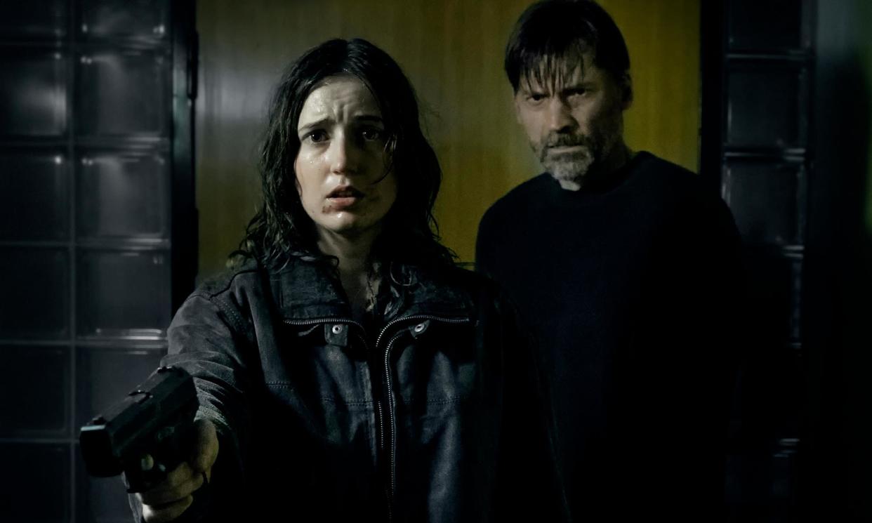 <span>Fanny Leander Bornedal and Nikolaj Coster-Waldau in Nightwatch: Demons Are Forever.</span><span>Photograph: Courtesy of Christian Greisnæs. A Shudder Release.</span>