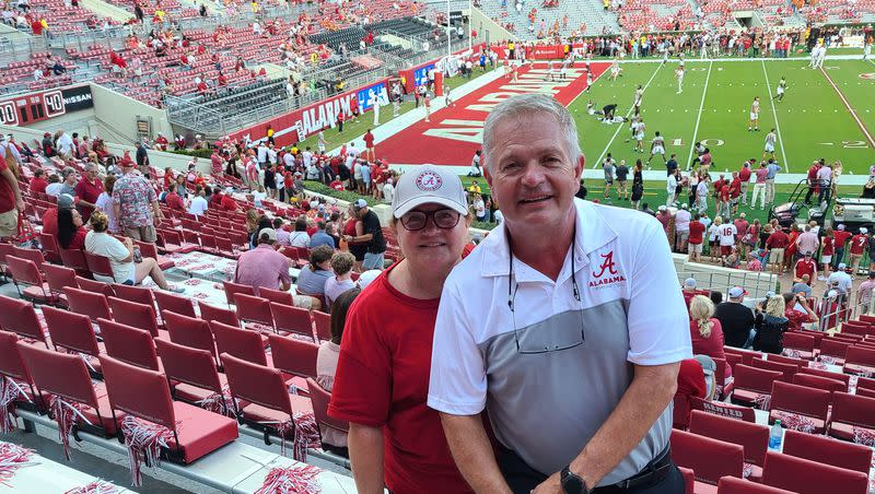 David and Karen Potter pose for a photo in Bryant-Denny Stadium ahead of Alabama’s game against Texas on Sept. 9, 2023.