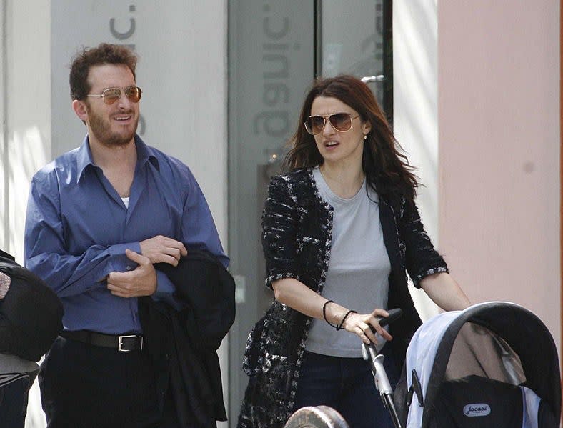 Rachel Weisz and Darren Aronofsky pushing son in stroller