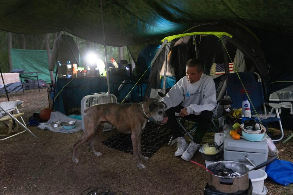 William Honeker lives in the camp with his dog Fred. He once owned a home in Leonardo section of Middletown, but through a series of problems has had to take refuge in the Toms River homeless camp.