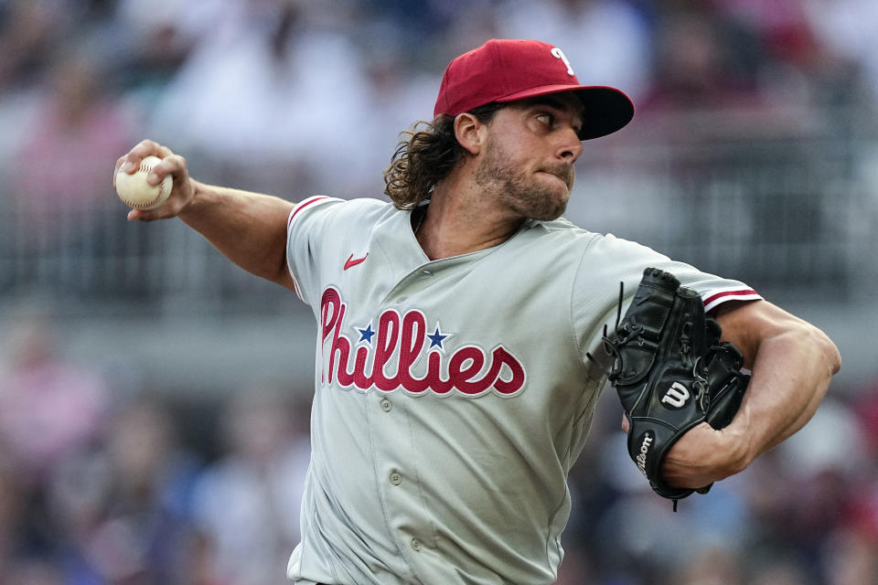 Philadelphia Phillies starting pitcher Aaron Nola works against the Atlanta Braves during the first inning of a baseball game Thursday, May 25, 2023, in Atlanta. (AP Photo/John Bazemore)
