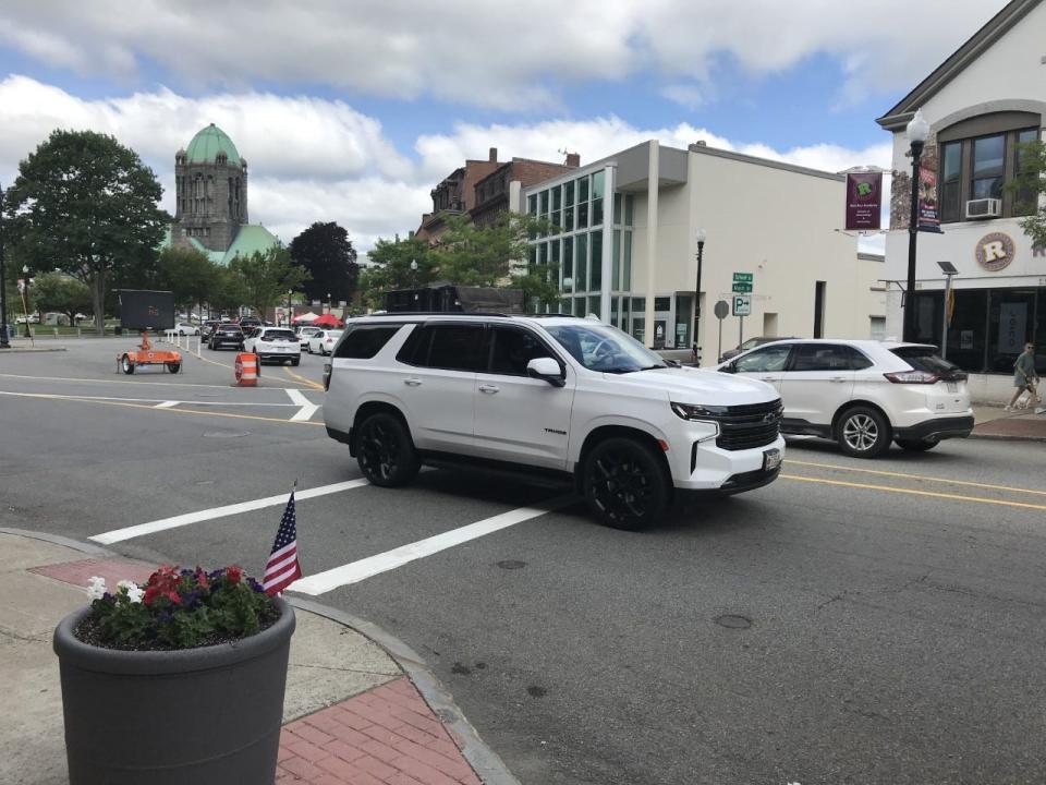 Taunton plans to make crosswalk at the corner of Main and School streets safer for people to use by installing a pedestrian flashing beacon light, colored pavement within the pathway and improved curbing