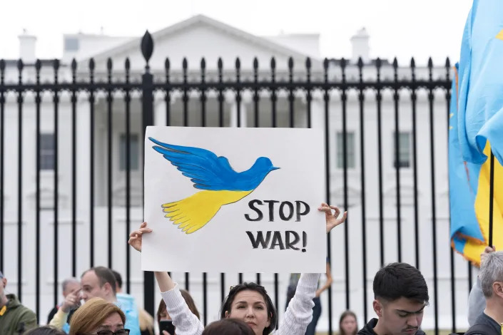People protest the Russian invasion of Ukraine during a rally outside of the White House in Washington, Sunday, March 6, 2022. ( AP Photo/Jose Luis Magana)