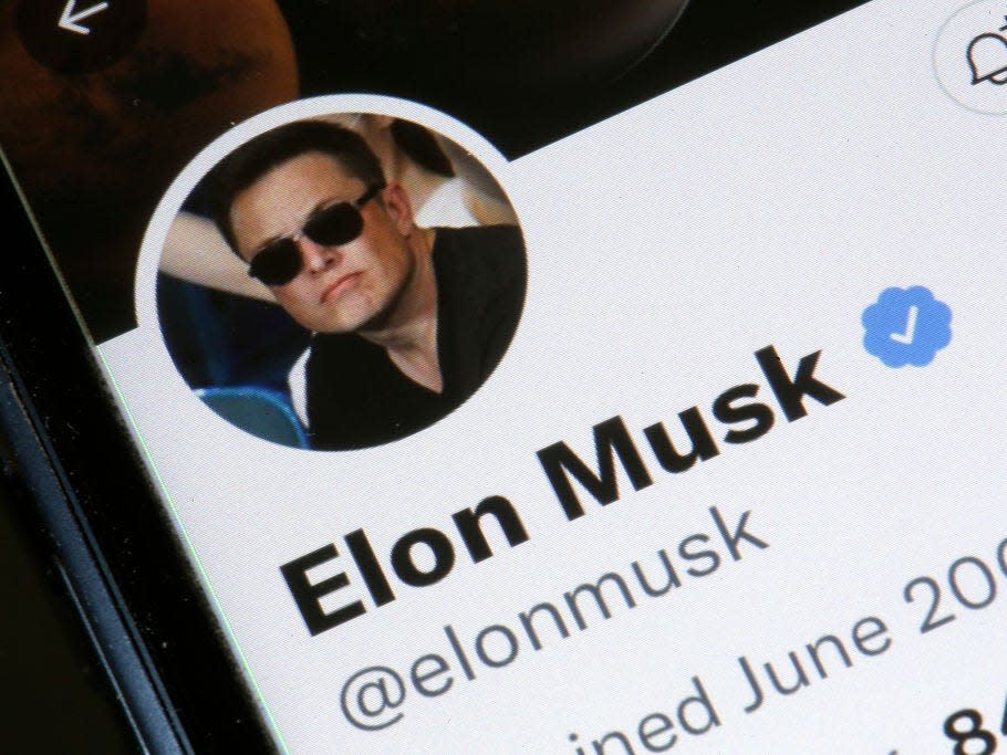 Elon Musk’s Twitter account is displayed on the screen of an iPhone on April 26, 2022 in Paris, France.