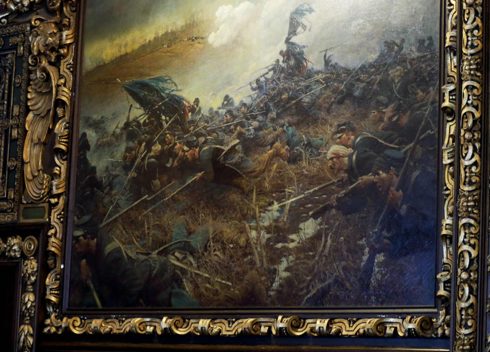 In this March 6, 2014 photo, the painting "The Battle of Nashville" hangs on the walls of the governor's reception room at the Minnesota State Capitol in St. Paul, Minn. Beginning in the spring, work crews will take down paintings and sculpture and cover murals and statues as the renovation continues on the century old building. A remark by Gov. Mark Dayton sparked debate whether the reception room need six paintings of Civil War scenes. (AP Photo/Jim Mone)