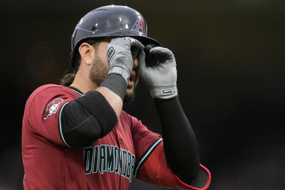 Arizona Diamondbacks' Eugenio Suarez celebrates after hitting a home run during the second inning of a baseball game against the San Diego Padres, Thursday, June 6, 2024, in San Diego. (AP Photo/Gregory Bull)