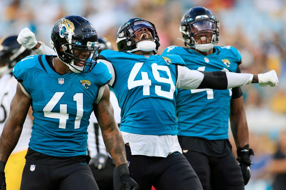 Jacksonville Jaguars defensive end Arden Key #49 reacts to recording a sack during the first quarter of an NFL preseason game Saturday, Aug. 20, 2022 at TIAA Bank Field in Jacksonville.