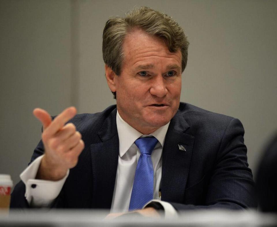 Bank of America CEO Brian Moynihan had his total compensation for last year fall by $2 million, according to a securities filing from the bank.
