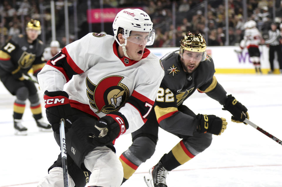 Ottawa Senators center Ridly Greig (71) skates against Vegas Golden Knights right wing Michael Amadio (22) during the third period of an NHL hockey game Sunday, Dec. 17, 2023, in Las Vegas. (AP Photo/Steve Marcus)