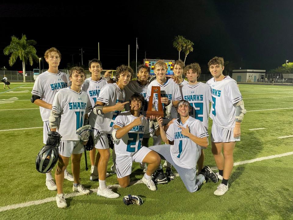 The Gulf Coast High School boys lacrosse team celebrates following its 13-3 win over Venice to win the Class 2A, District 12 championship on Wednesday, April 17, 2024.