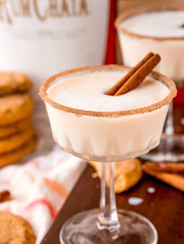 <p>Spend With Pennies</p><p>A cross between a cinnamon vanilla milkshake and buttered rum, what more could you want to drink on Thanksgiving?</p><p><strong>Get the recipe: <a href="https://www.spendwithpennies.com/snickerdoodle-cocktail-with-rumchata/" rel="nofollow noopener" target="_blank" data-ylk="slk:Snickerdoodle Cocktail;elm:context_link;itc:0;sec:content-canvas" class="link rapid-noclick-resp">Snickerdoodle Cocktail</a></strong></p>