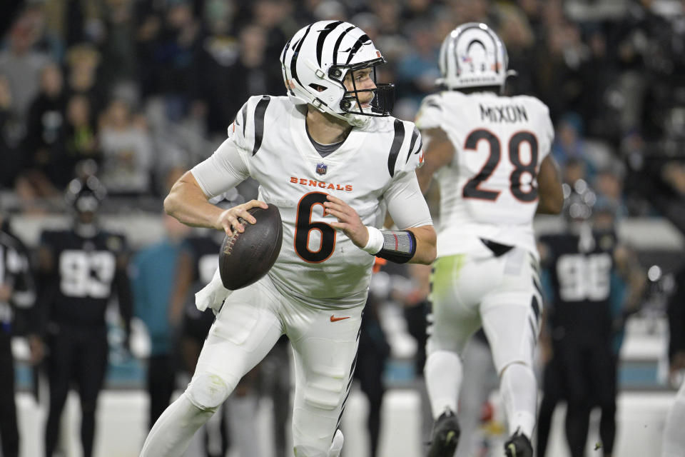 Cincinnati Bengals quarterback Jake Browning (6) looks to pass the football during the first half of an NFL football game against the Jacksonville Jaguars, Monday, Dec. 4, 2023, in Jacksonville, Fla. (AP Photo/Phelan M. Ebenhack)