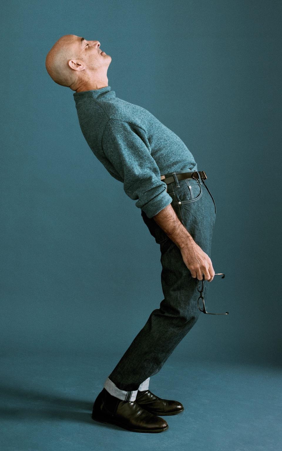 Stanley wears: sweater and jeans, 45R; boots and belt, Tucci’s own - Adam Whitehead; styling by David Nolan