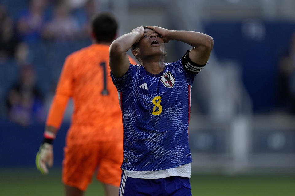 Japan midfielder Joel Chima Fujita (8) reacts after missing a goal during the first half of an international friendly under-23 soccer match against the United States on Tuesday, June 11, 2024, in Kansas City, Kan. (AP Photo/Charlie Riedel)