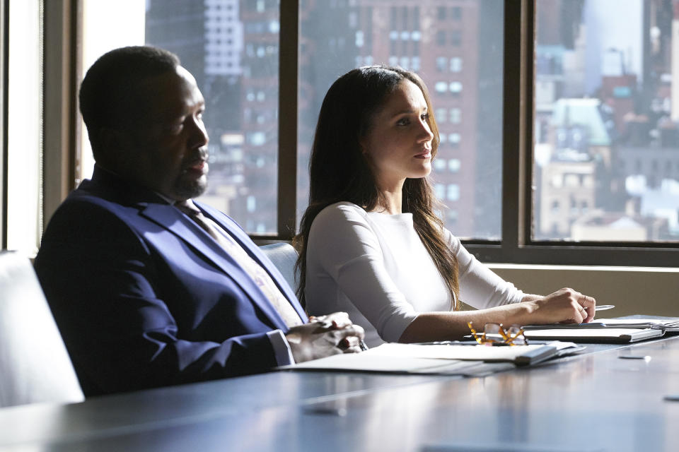 SUITS -- "Shame" Episode 709 -- Pictured: (l-r) Wendell Pierce as Robert Zane, Meghan Markle as Rachel Zane -- (Photo by: Ian Watson/USA Network/NBCU Photo Bank/NBCUniversal via Getty Images)