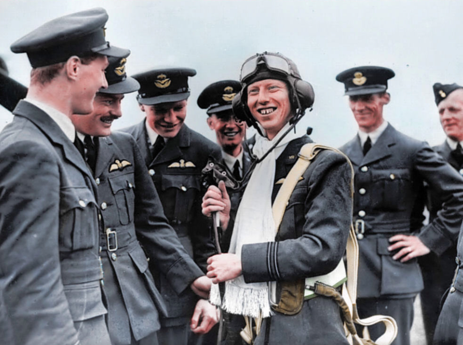 <p>Second World War fighter pilot Flight Lieutenant James ‘Ginger’ Lacey, downed at least 28 enemy planes. Here he is awarded a silk scarf. (MediaDrumWorld) </p>